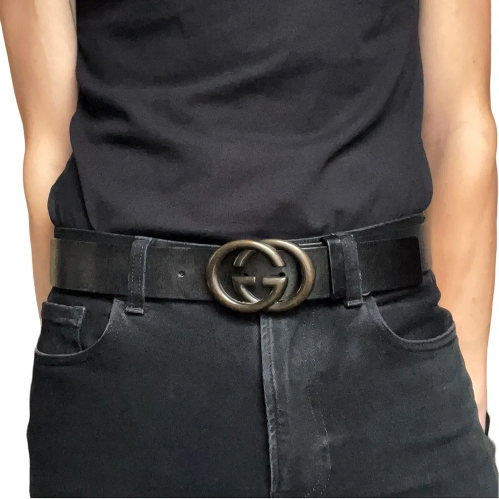 Gucci black leather solid bronze interlocking GG buckle belt